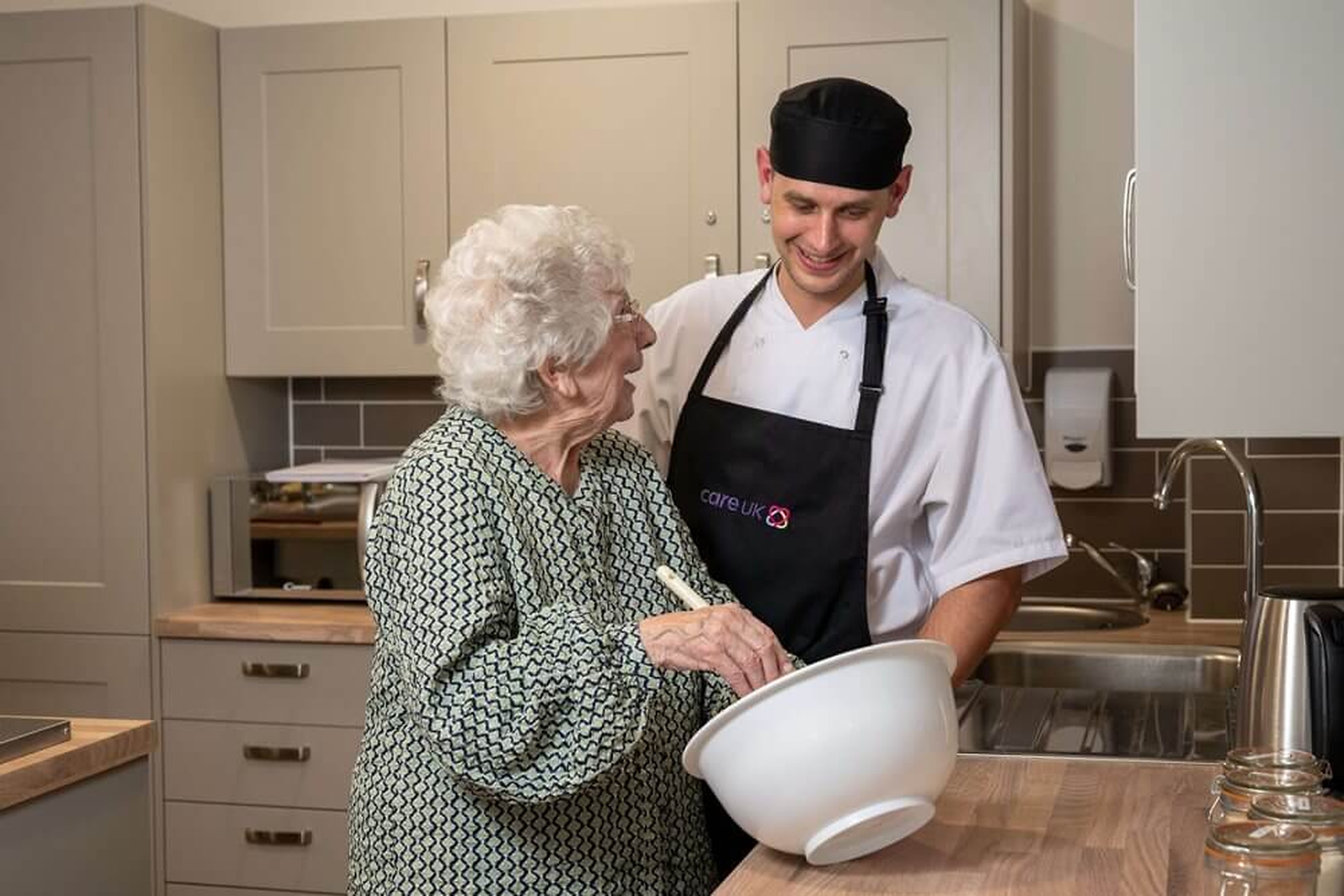 Care-home shared cooking — high-resolution reference photography
