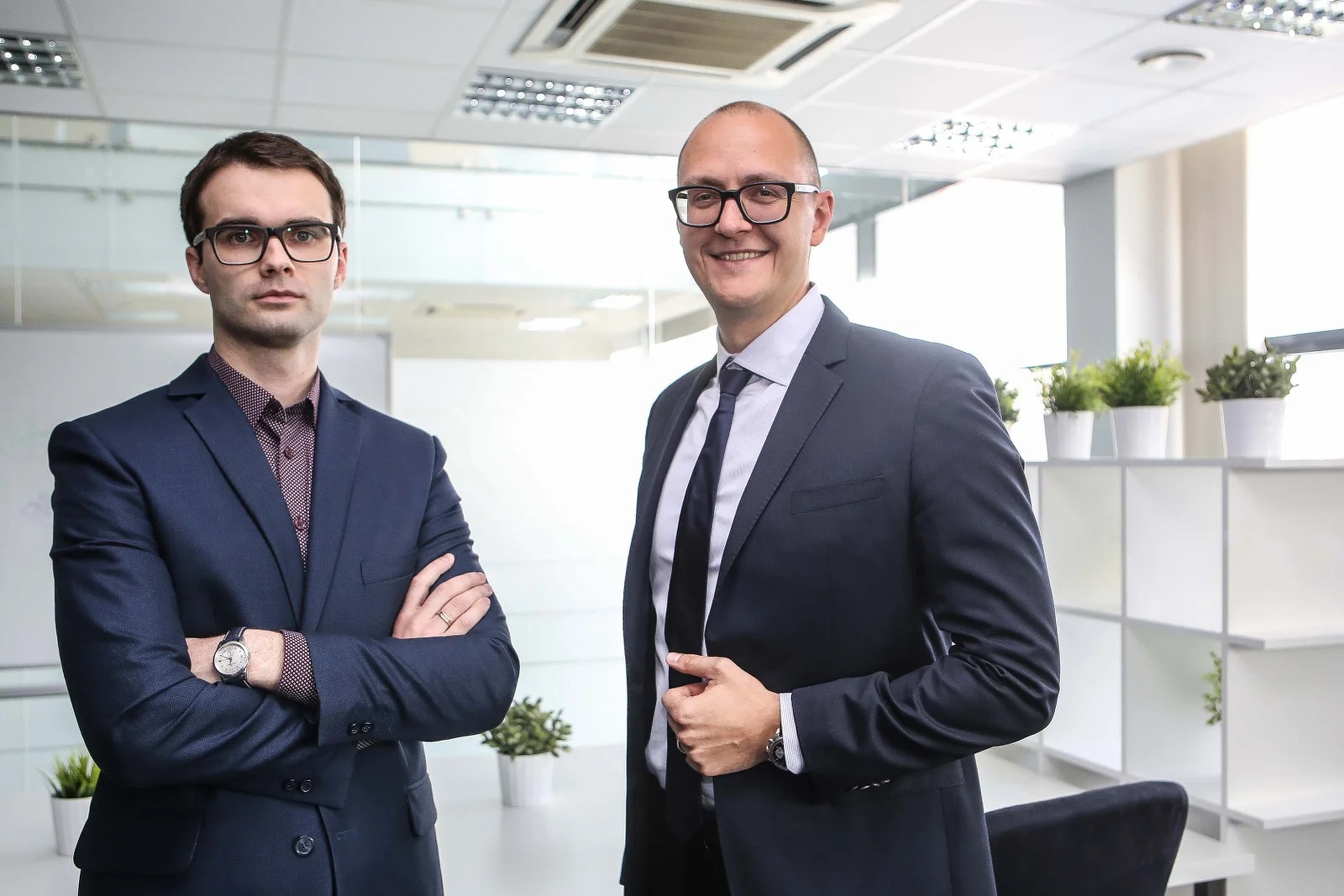 Professional business leaders collaborating in a modern office