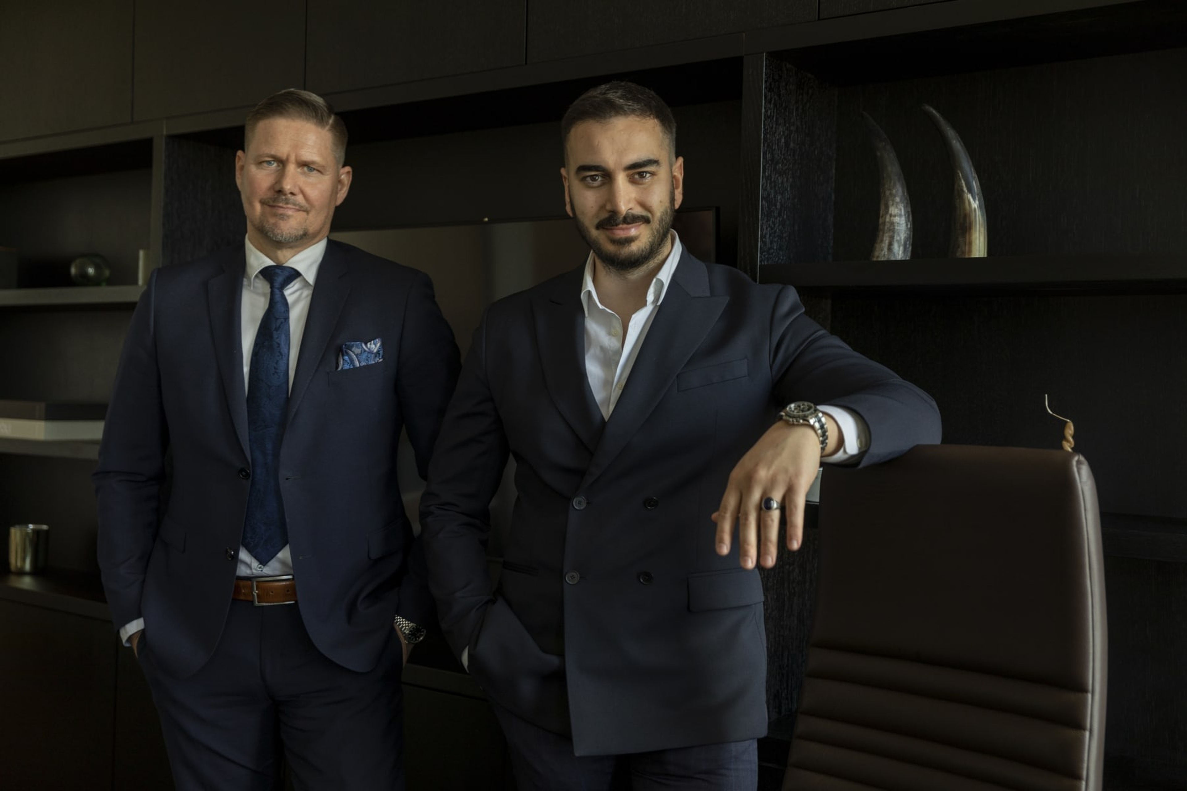 Professional executive portrait in a dark suit